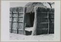 Hut compound, view of entrance to courtyard