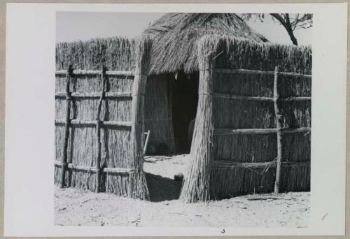 Hut compound, view of entrance to courtyard