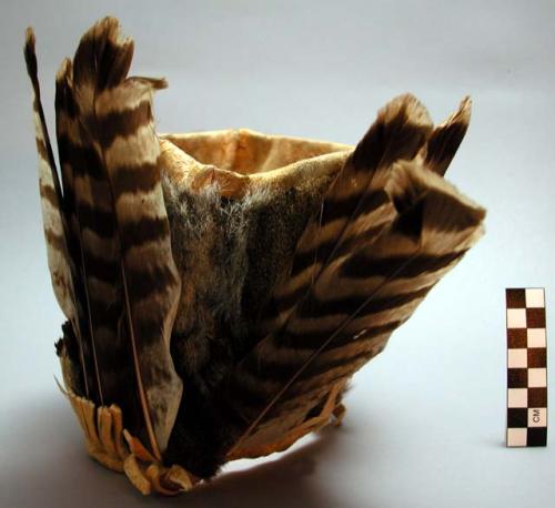 Wide head band of squirrel skin lined with buckskin.