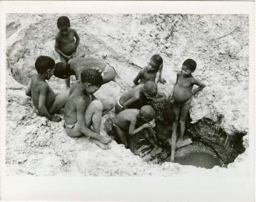 [No folder title]: Children at waterhole (print is a cropped image)