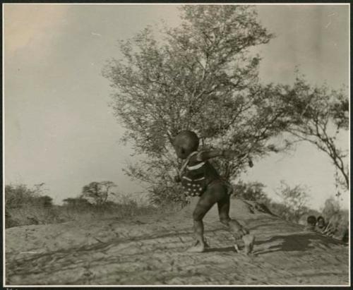 [No folder title]: /Gaishay playing the stick-throwing game (print is a cropped image)