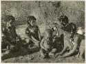 "Little N!ai" (left) and three unidentified girls sitting with !Ungka Norna (center)