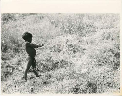 "Children in groups": /Gaishay shooting an arrow (print is a cropped image)