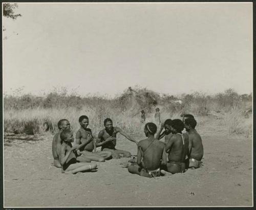 "Porcupine or Axe and Assegai [game]": playing !ó'm!hú /!’Om g!xuni / ’Ai kota !U!u g!xuni / N!aih //’an (the porcupine game, also known as the axe game, assegai game or war game) (print is a cropped image)