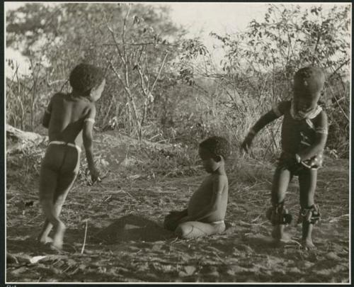 "Children playing curing dance": /Gaishay (son of Di!ai and "Gao Medicine"), Bau (daughter of "Crooked /Qui" and //Khuga), and "Little ≠Gao" (son of "/Qui Navel" and //Kushay) dancing a medicine dance (print is a cropped image)