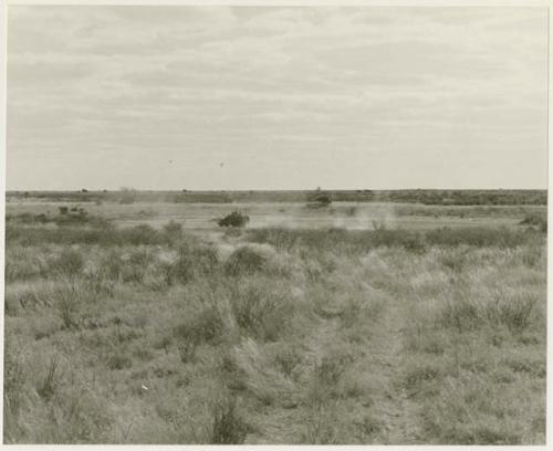 Landscape with a Jeep in the foreground (print is a cropped image)