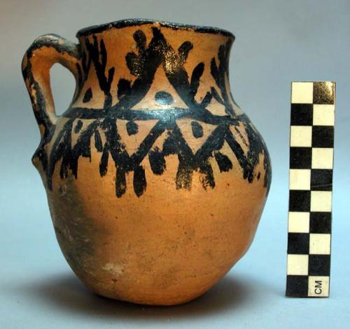 Ornamented mug, pottery