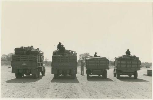 Expedition trucks lined up at Ghanzi, seen from behind (print is a cropped image)