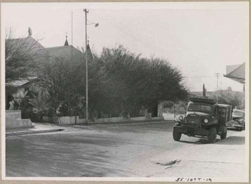 Truck parked across the street from the Hotel Grossherzog (print is a cropped image)