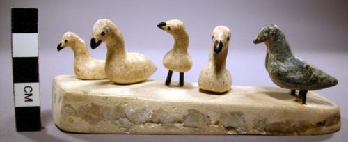 Carving - 4 wooden swans & 2 stone geese