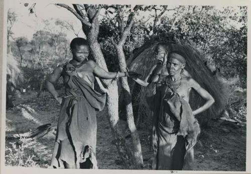 Three women standing
