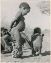 "Children playing curing dance": "Little ≠Gao" (son of "/Qui Navel") dancing with /Gaishay (son of "Gao Medicine" and Di!ai) (print is a cropped image)