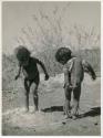 "Children playing curing dance": /Gaishay (son of "Gao Medicine") and "Little ≠Gao" (son of /Qui and //Kushay) dancing and playing medicine man (print is a cropped image)