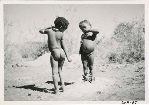 "Children playing curing dance": /Gaishay (son of "Gao Medicine") and "Little ≠Gao" (son of /Qui and //Kushay) dancing and playing medicine man (print is a cropped image)