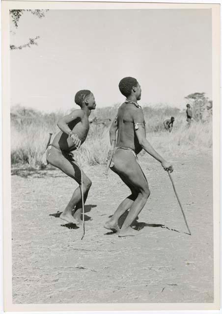 "Daytime Dance at Gautscha 1952, Early in the Dance, approach": Child dancing beside her father (print is a cropped image)