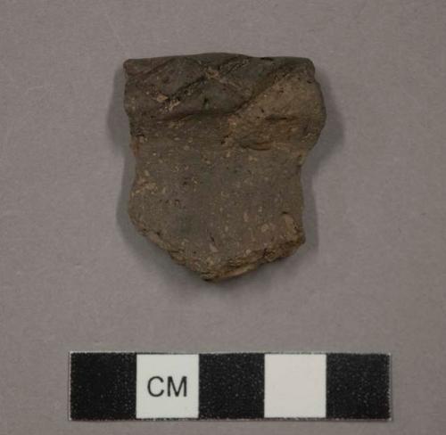 Ceramic, earthenware rim sherd, incised rim, undecorated body, shell-tempered