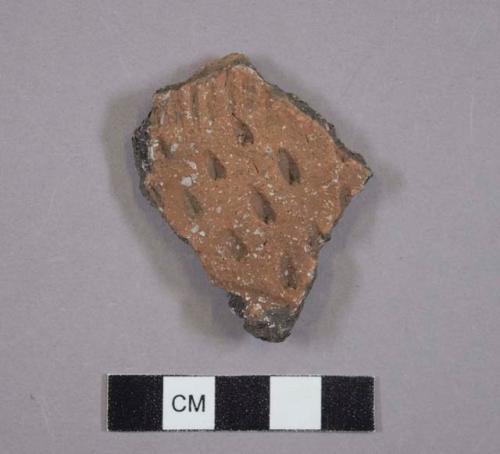Ceramic, earthenware body sherd, punctate, cord-impressed, and incised, shell-tempered