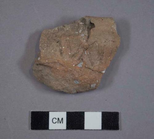 Ceramic, earthenware rim sherd, incised, shell-tempered