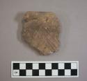 Ceramic, earthenware rim sherd, incised, shell-tempered