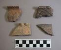 Ceramic, earthenware rim sherds, one with notched rim and cord-impressed body, one with molded rim and undecorated body, one incised along rim, one incised, shell-tempered