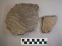 Ceramic, earthenware rim and body sherds, one incised, one incised and cord-impressed, shell-tempered