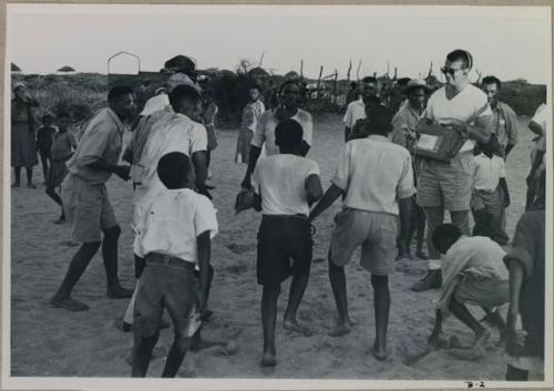 Boys playing in a school yard, Nicholas England recording sound




