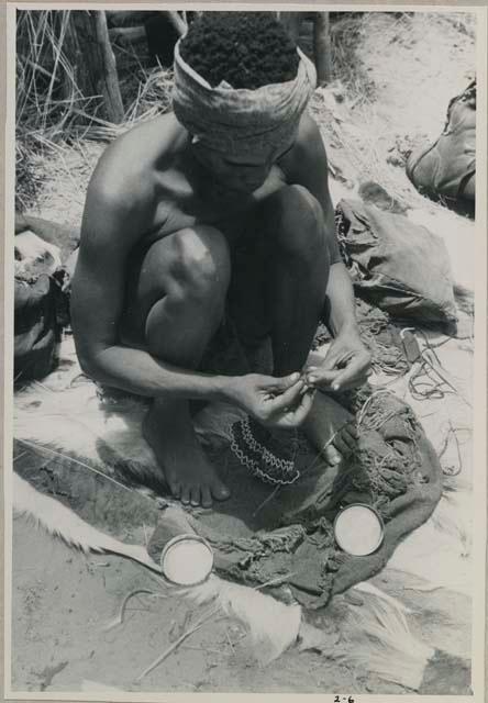 Dadum working on her bead work (copy of color slide 2001.29.8363)



