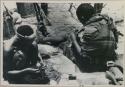 Dadum and Tama sitting and working on beadwork and sewing (copy of color slide 2001.29.8365)





