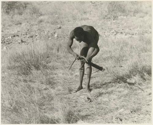 "Crooked /Qui" leaning over with his bow and quiver in his hand (print is a cropped image)