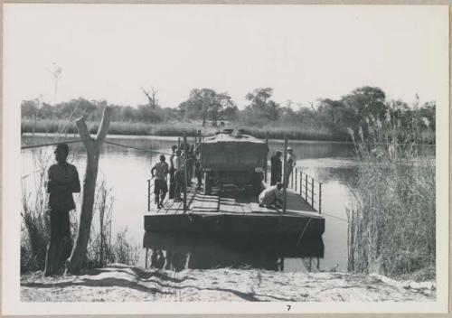 Truck on a float (print is a cropped image)