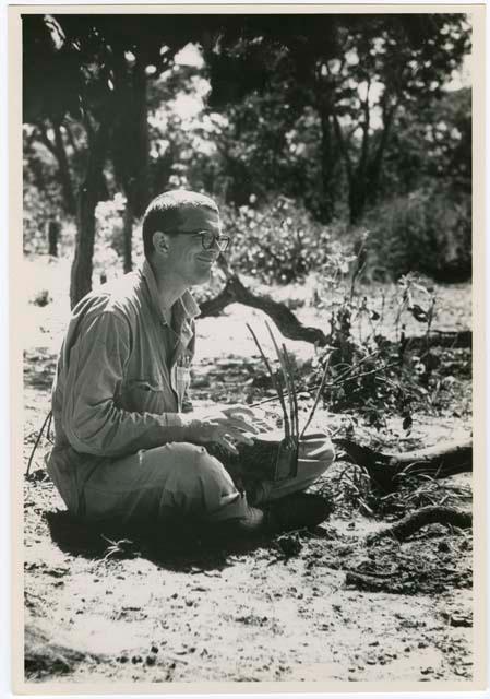 "Misc. prints from slides": Nicholas England playing a //guashi (print of slide 2001.29.10383)