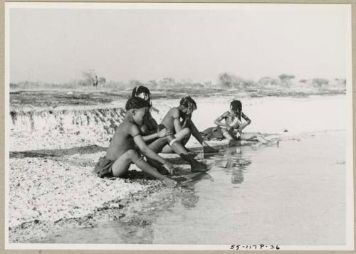 Women and girls at the edge of Nama Pan (print is a cropped image)