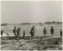 Women and children at Nama Pan, distant view (print is a cropped image)
