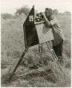 John Marshall with his camera in a sound-proofing box (print is a cropped image)

























