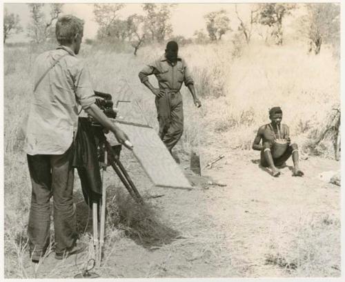 John Marshall, Kernel Ledimo, and "/Gao Music" sitting and holding a //guashi (print is a cropped image)











