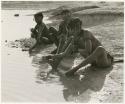 Three women bathing in Nama Pan (print is a cropped image)