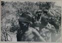 [No folder title]: Group of women beginning to dance, close-up view