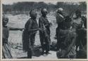 [No folder title]: Group of women clapping; left to right: Tomku, /Oβa, "old Nǂisa", N//aba, and Dadum