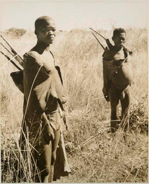 [No folder title]: Oukwane and !Gai standing with their hunting equipment

