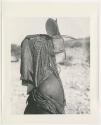 "1950's 400 series": Woman wearing headdress, profile (print is a cropped image)