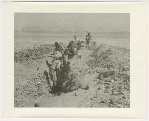 "1950's 400 series": Men digging a ditch (print is a cropped image)