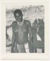 "Glossy duplicates of / 1950 Merl La Voy prints / 400 series": Woman standing (print is a cropped image)