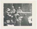 "1950 '400 Series' / 87 B/W prints (some duplicates) / Ovamboland": Government officials collecting grain tax from Ovambo people (print is a cropped image)