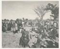 "1950 '400 Series' / 87 B/W prints (some duplicates) / Ovamboland": Group of people sitting and standing (print is a cropped image)