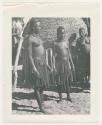 "1950 '400 Series' / 87 B/W prints (some duplicates) / Ovamboland": Women standing in front of a storage basket (print is a cropped image)