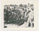 "1950 '400 Series' / 87 B/W prints (some duplicates) / Ovamboland": Group of people standing (print is a cropped image)