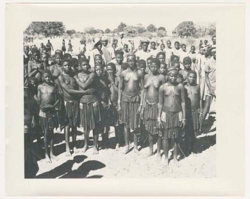 "1950 '400 Series' / 87 B/W prints (some duplicates) / Ovamboland": Group of people standing (print is a cropped image)