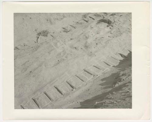 "1950's 400 series": Tire chains for expedition truck laid out in the track (print is a cropped image)