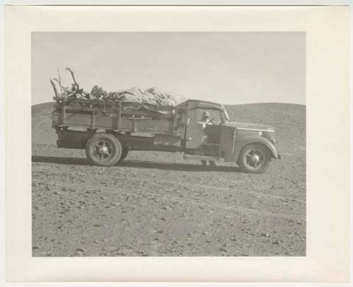 "1950's 400 series": Expedition truck, after being pushed out of the sand (print is a cropped image)