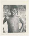 "1950 '400 Series' / 87 B/W prints (some duplicates) / Ovamboland": Man standing, portrait (print is a cropped image)